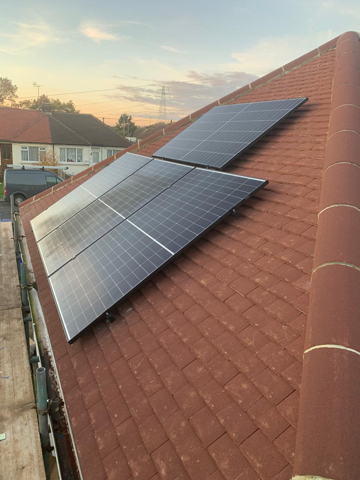 Solar panels fitted on a customer’s roof following it being re-tiled