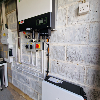 Growatt Hybrid Inverter and battery in location at a customer’s house